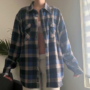 navy and orange plaid flannel shirt